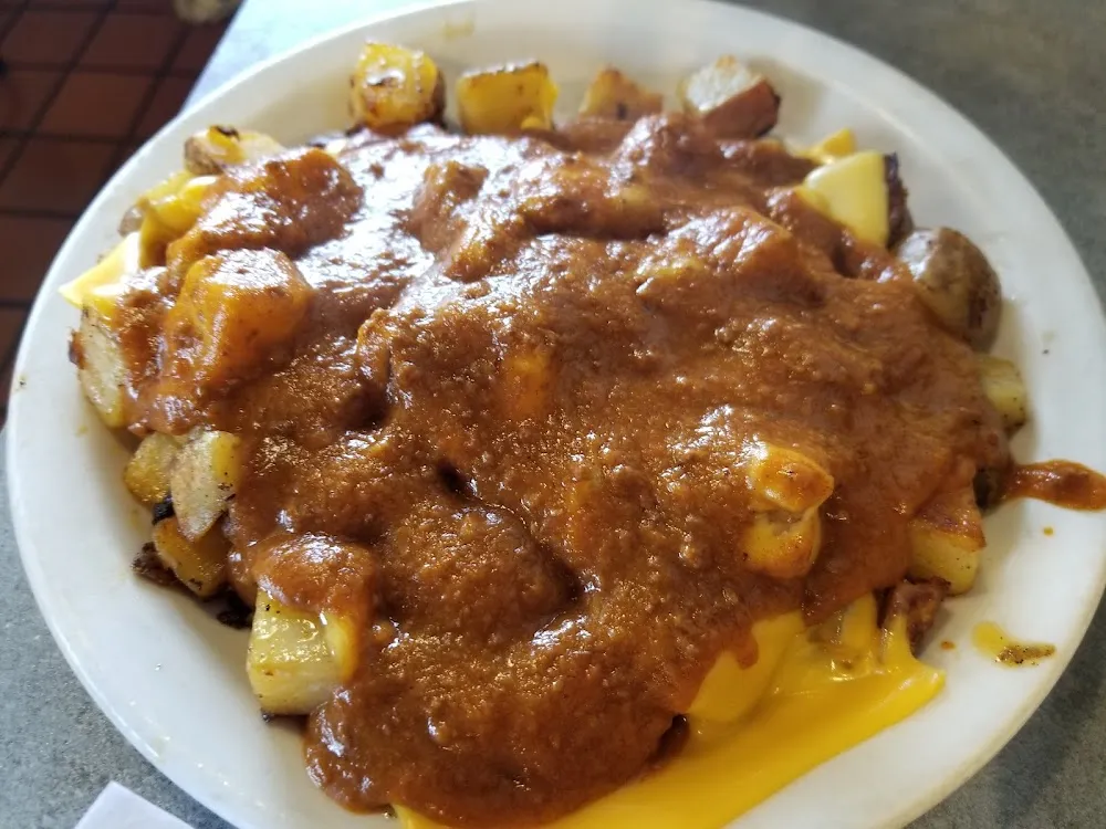 Home Fried Potatoes with Cheese and Zorbas Sauce